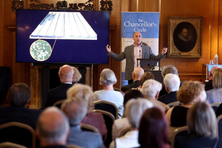 James Rae, an academic at the University of St Andrews, gives a lecture to guests